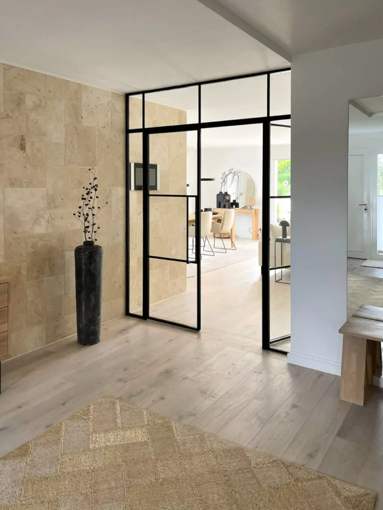 steel-interior-projekt-dortmund-wohnzimmer-doppeltür-drehtür-windfang